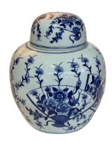 Large Chinese ginger jar with blue and white floral decoration.