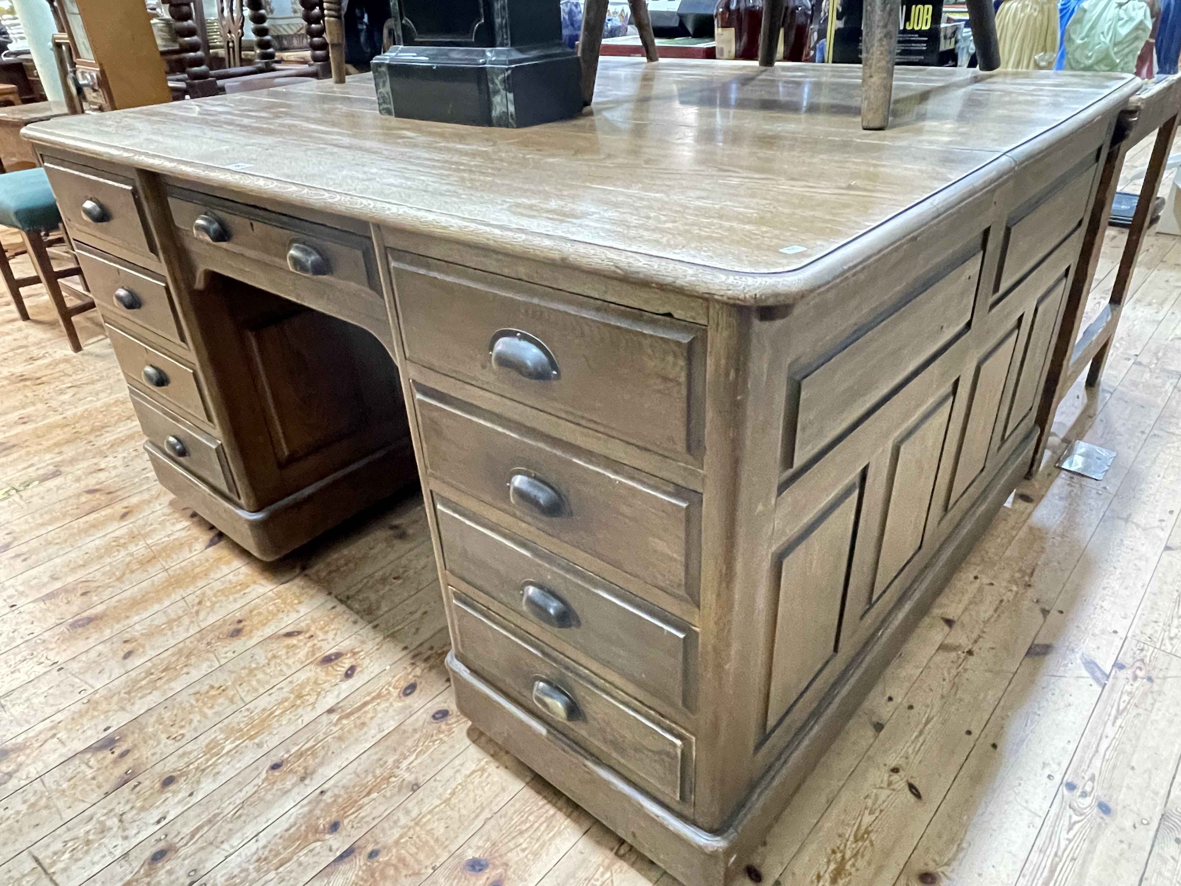 Oak partners desk having nine drawers to front and reverse, 81cm by 153cm by 119cm. - Image 2 of 2