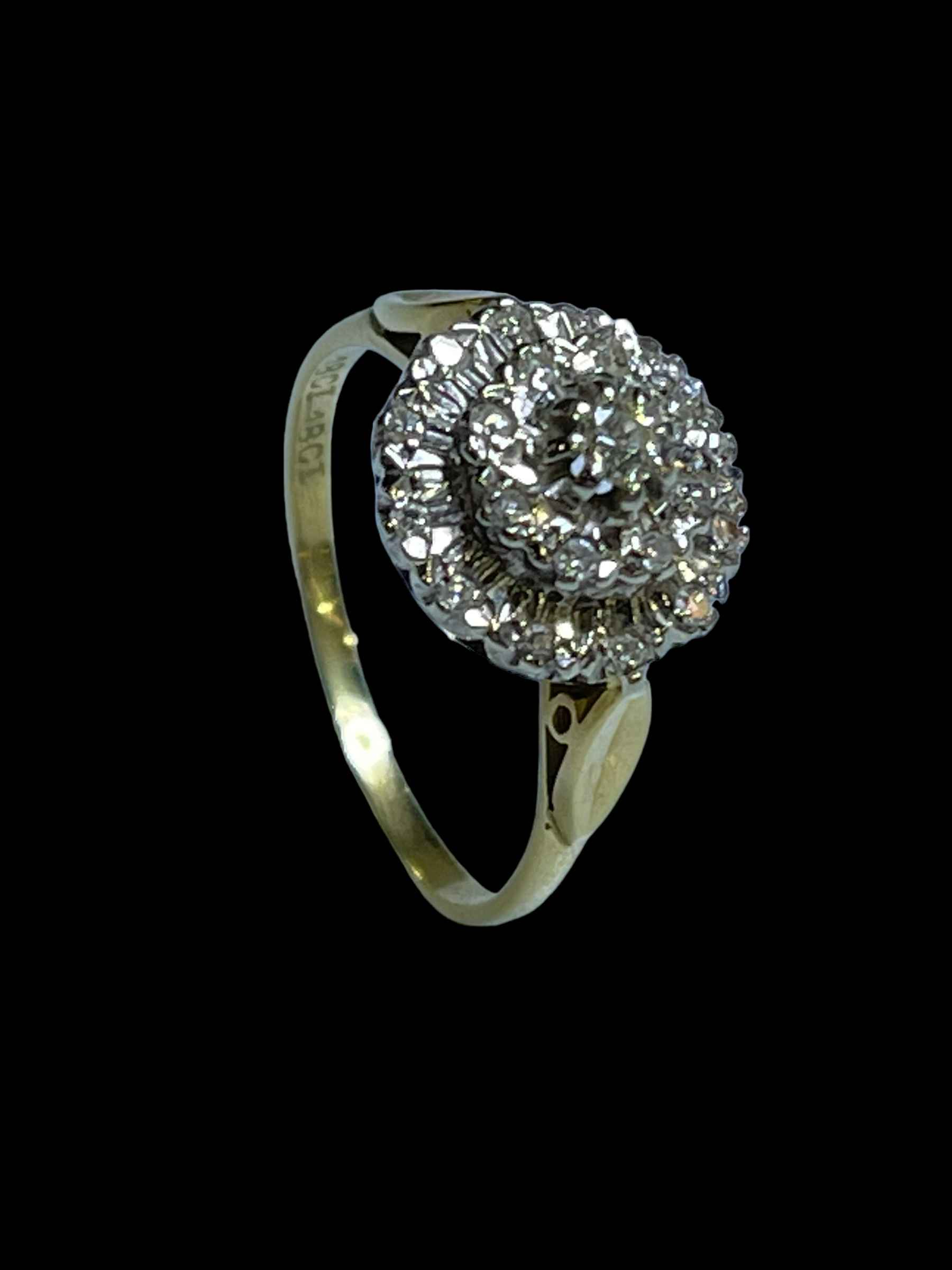 Diamond cluster 18 carat gold ring, size R.
