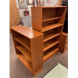 Two teak open bookcases, largest 133cm by 81cm by 28cm.