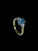 Aquamarine and diamond 18 carat gold ring, size L/M.