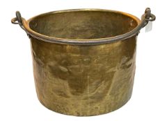 Large Victorian brass log bucket with iron swing handle, 40cm diameter.