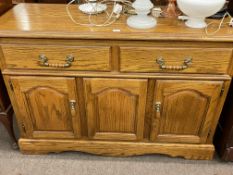 Old Charm carved oak two door cabinet,