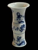 Chinese blue and white waisted vase decorated with figures and floral design, 22cm.