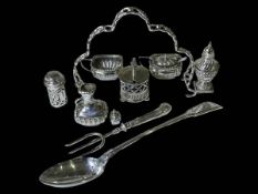 Two silver pepperettes, EP basting spoon, cruets, bread fork and cake plate handle.