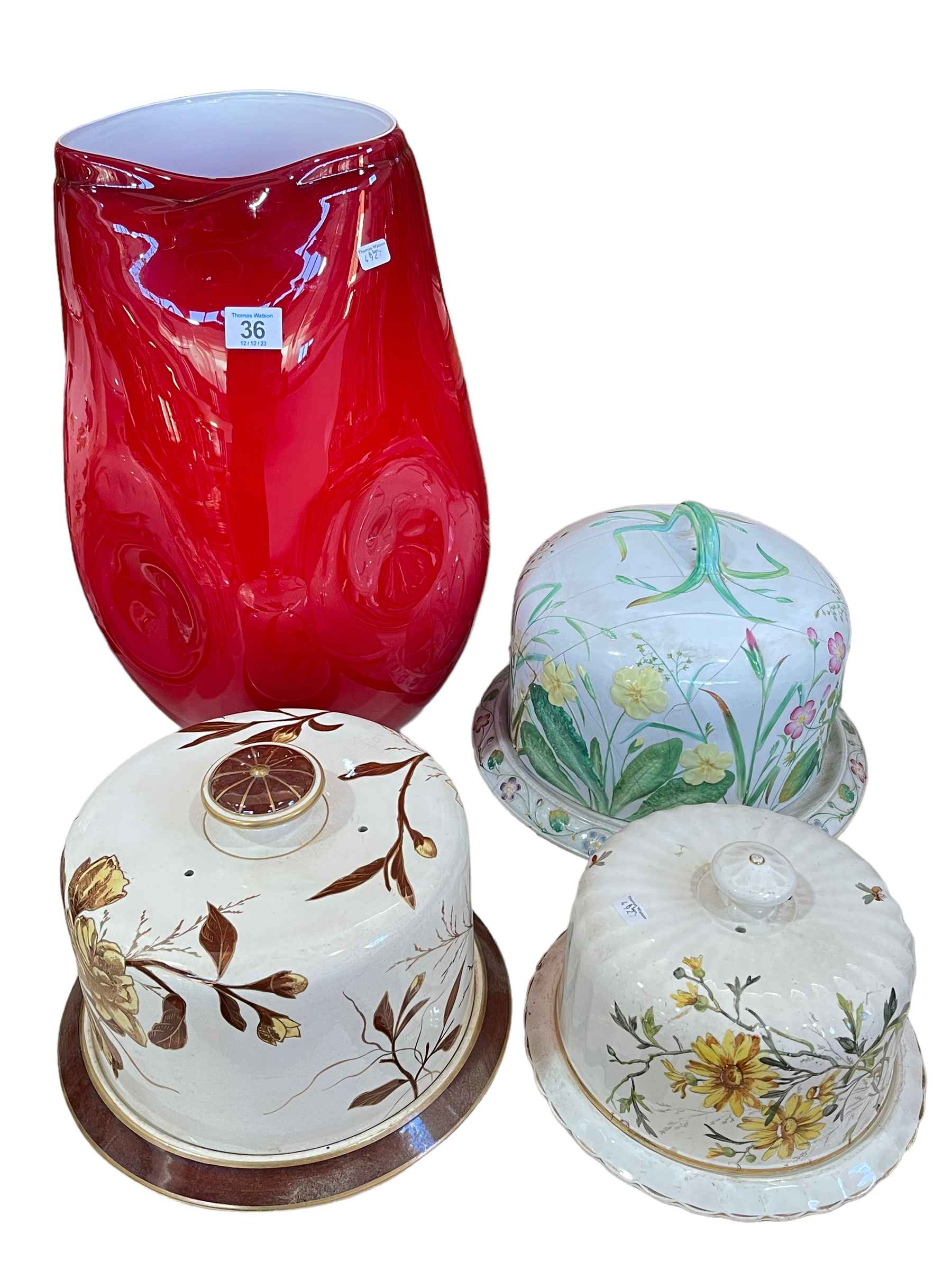 Large red art glass vase 43cm, and three stilton covers and stands (4).