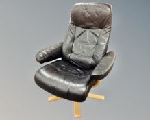A black swivel relaxer armchair.