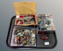 A tray of costume jewellery,