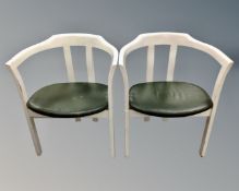 A pair of painted Edwardian armchairs.