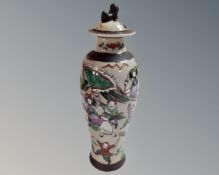 A Japanese crackle glazed lidded vase,