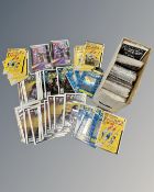 A box containing a collection of Marvel comics including Ultimate X-Men, The Spectacular Spider-Man,