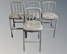 A set of four breakfast bar chairs.
