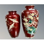 Two 20th century Japanese red cloisonne vases depicting storks in flight, height 21.