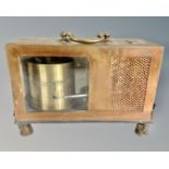 A vintage copper cased thermograph.