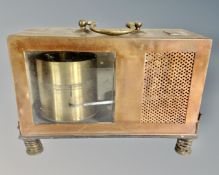 A vintage copper cased thermograph.
