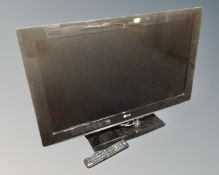 An LG 32" LCD TV with remote.