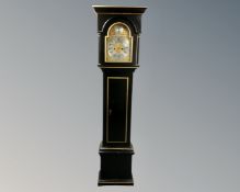 A 20th century continental black and gilt longcase clock with brass and silvered dial signed F. L.