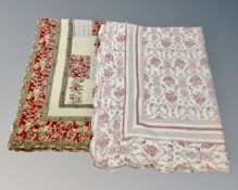 Two stitched patchwork quilts; one red and green labeled Clare & Eef measuring 246cm by 177cm,
