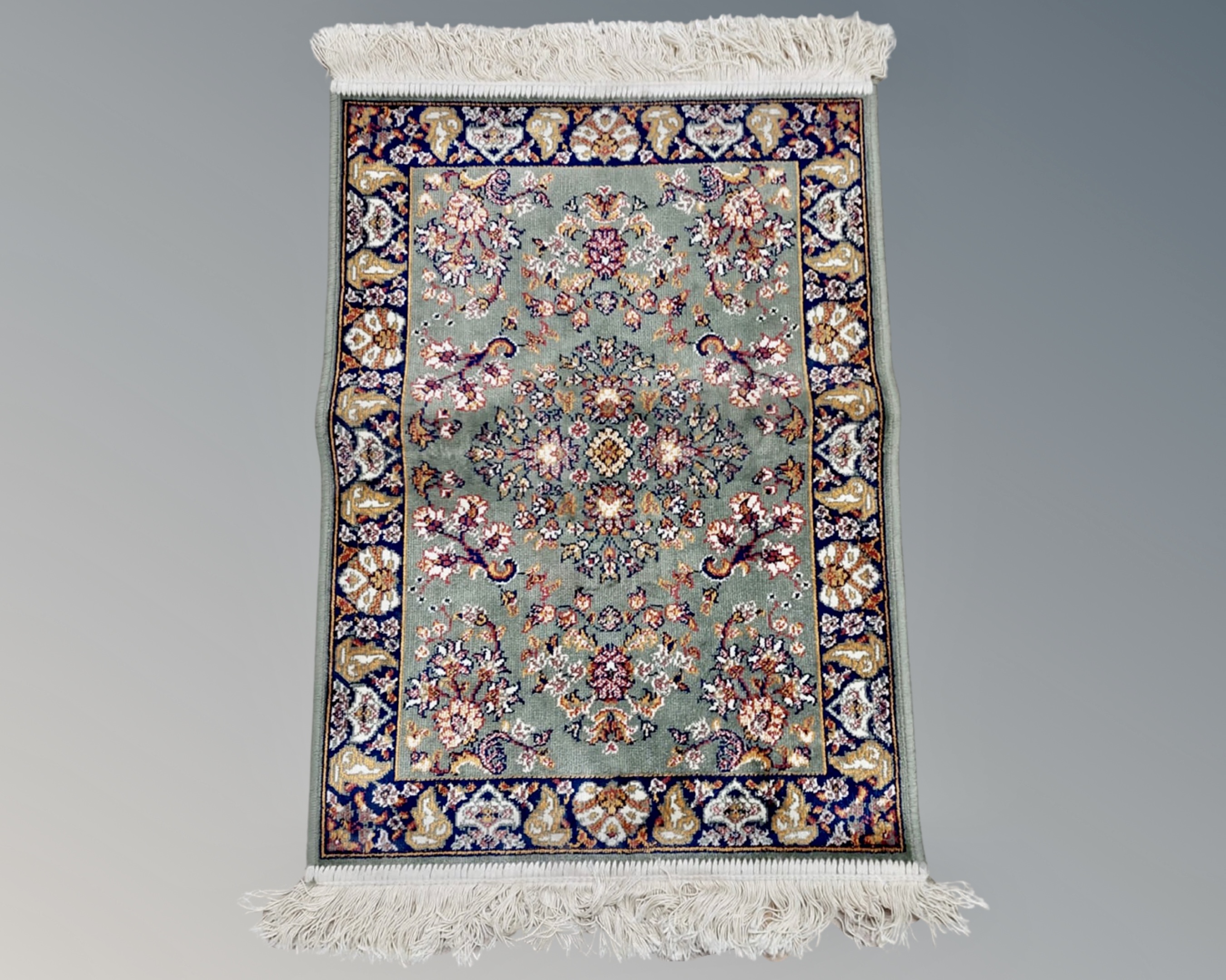 A small machined Persian style rug,