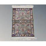 A small machined Persian style rug,