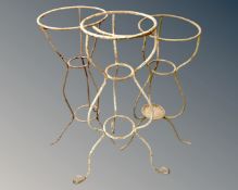 Three wrought iron wash stands.