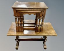 A nest of three heavy oak tables together with an oak refectory coffee table.