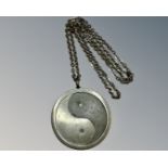 A Georg Jensen 'Yin and Yang' pewter pendant on chain.