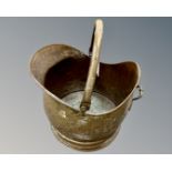 A Victorian brass coal bucket