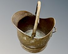 A Victorian brass coal bucket