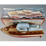 A vintage Cragstan battery operated cabin cruiser, in original box.