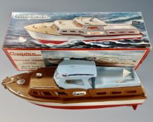 A vintage Cragstan battery operated cabin cruiser, in original box.