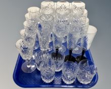 A tray containing assorted drinking glasses.