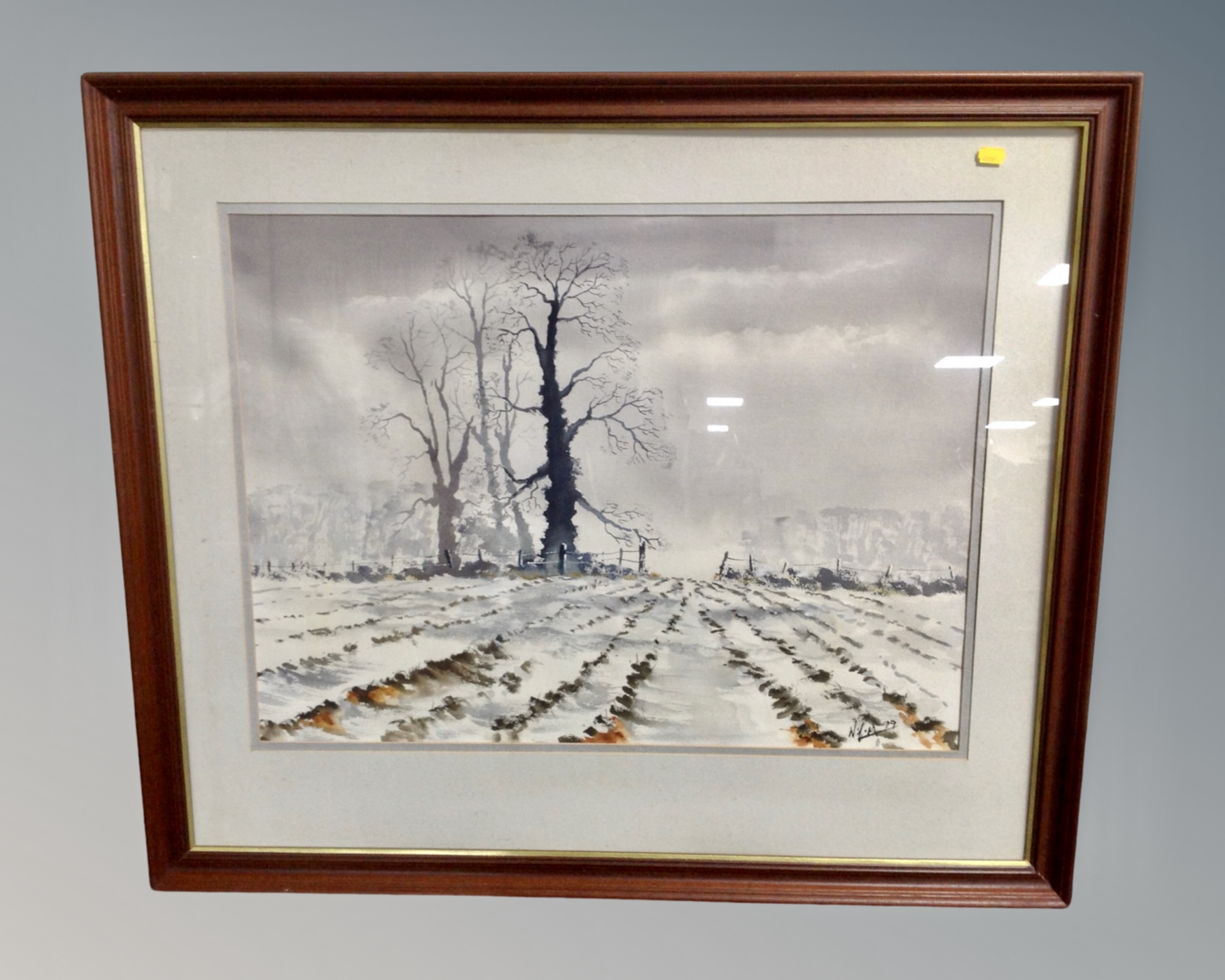 A watercolour study of a winter landscape, indistinctly signed,