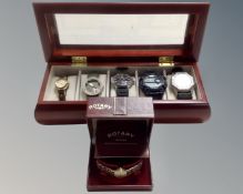 A watch box containing five various wristwatches - Radley,