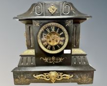 A Victorian black slate and brass-mounted 8-day mantel clock,