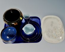 A tray containing 16 assorted pieces of Denby dinnerware including meat plate and planter.
