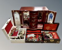 A tray containing three jewellery boxes and a cabinet containing a large quantity of assorted