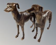 A pair of cast iron greyhound figures.