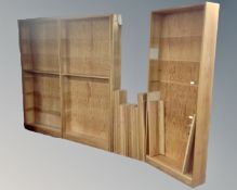 A four section pine modular bookcase (total length 330cm)