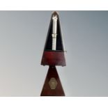 A Maelzel metronome.