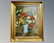 Continental school : Still life with flowers in a vase, oil on canvas, 46cm by 61cm.
