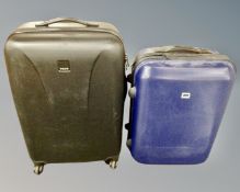 Two hard shell luggage cases by Landor and Tripp.