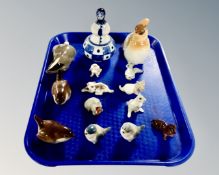 A tray containing porcelain animal figures including Russian examples.
