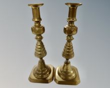 A pair of Victorian brass candlesticks (height 33cm)