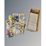 A box containing a large collection of Marvel's The Amazing Spider-Man comics.