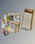 A box containing a large collection of Marvel's The Amazing Spider-Man comics.