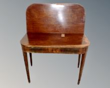 A 19th century mahogany turnover top tea table (width 94cm)