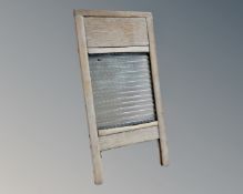 A vintage pine and glass washboard (height 45cm)