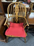 An elm and beech wood Windsor armchair.