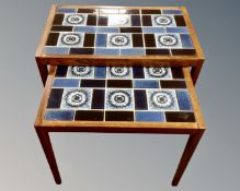 A nest of two 20th century Danish tile topped tables.